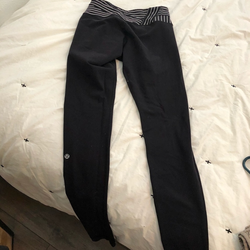 Black lululemon leggings with stiripey top band